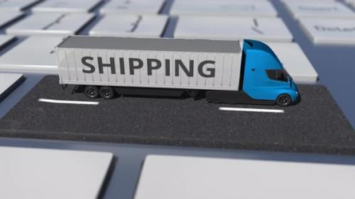 Videohive - SHIPPING Text on the Truck Driving on the Keyboard Key - 35082580
