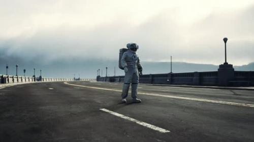 Videohive - Astronaut in Space Suit on the Road Bridge - 35496141