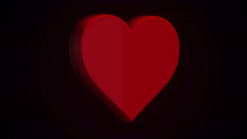Videohive - Animation of a rotating red heart on a black background - 35377156