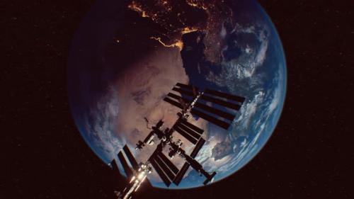 Videohive - International Space Station in Outer Space Over the Planet Earth Orbit - 35536167