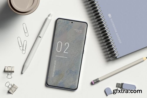 Smartphone with office items mockup