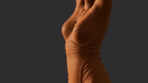 Videohive - Woman in Futuristic Orange Leather Suit - 36082223