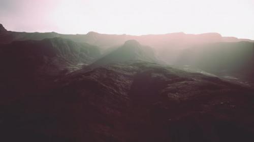 Videohive - Dark Atmospheric Landscape with High Black Mountain Top in Fog - 36390581