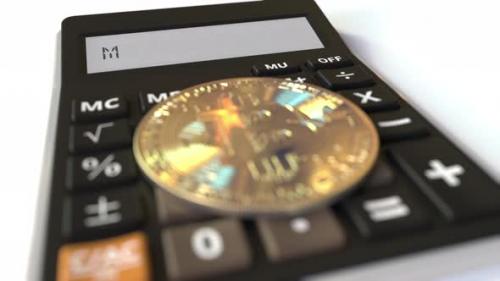 Videohive - Bitcoin Currency Symbol on the Keys and MINING Text on Calculator - 36407152