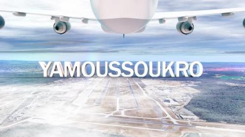 Videohive - Commercial Airplane Over Clouds Arriving City Yamoussoukro - 36658443