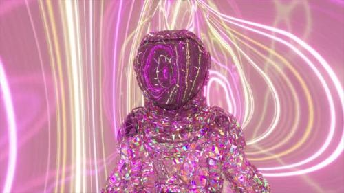 Videohive - An Astronaut in a Diamond Suit Walks Against the Backdrop of Pink and Yellow Glowing Neon Lines - 37520665