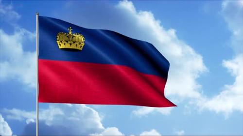 Videohive - The flag of the State of Liechtenstein rippling in the wind against a blue sky with flowing clouds - 37835019