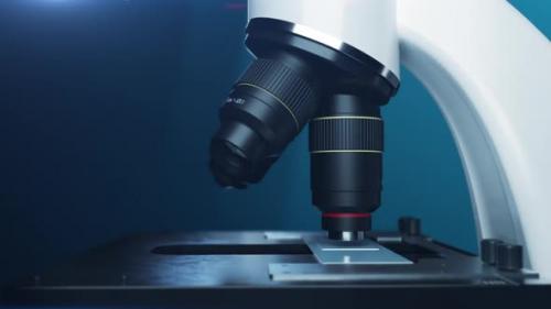 Videohive - close-up microscope. the lenses change the magnification ratio while observing viruses. - 37969980