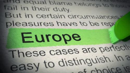 Videohive - Europe. Highlighter pen marks word in Newspaper. Closeup. Thumbing pages and promoting text with mar - 38028534