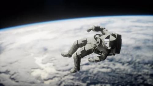 Videohive - Astronaut in Outer Space Elements of This Image Furnished By NASA - 38776472