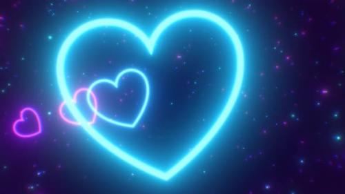 Videohive - Fly Through Pink Blue Fast Neon Glow Light Speed Heart Shaped Tunnel - 4K - 38849092