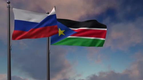 Videohive - South Sudan Flag Waving Along With The National Flag Of The Russia - 4K - 39652035