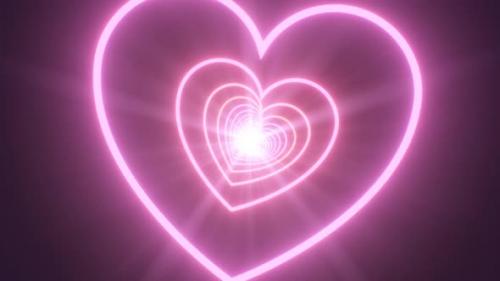 Videohive - Flying Through Pink and Blue Bright Glowing Neon Twisted Heart Tunnel - 4K - 42723313