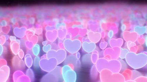 Videohive - Tiny Spinning Pink and Blue Hearts Glowing Inside Reflection Room - 4K - 42723329