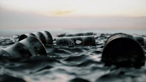 Videohive - Empty Oil Barrels Float in a Sea of Oil - 43149715
