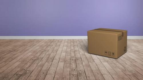 Videohive - Animation of cardboard box falling on wooden floor with purple wall in the background - 43354364