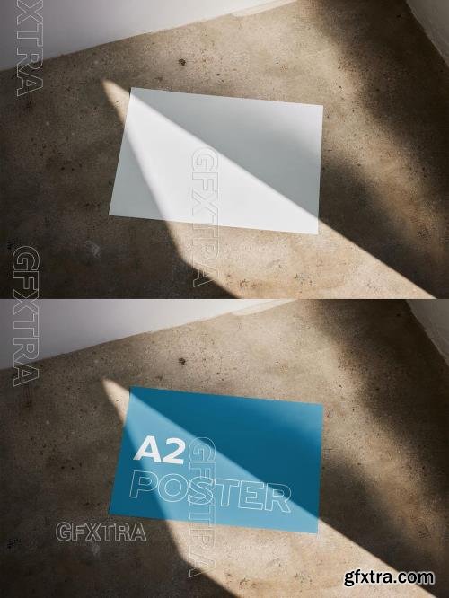 Horizontal A2 Paper Poster Mockup WIth Sunlight 544818107