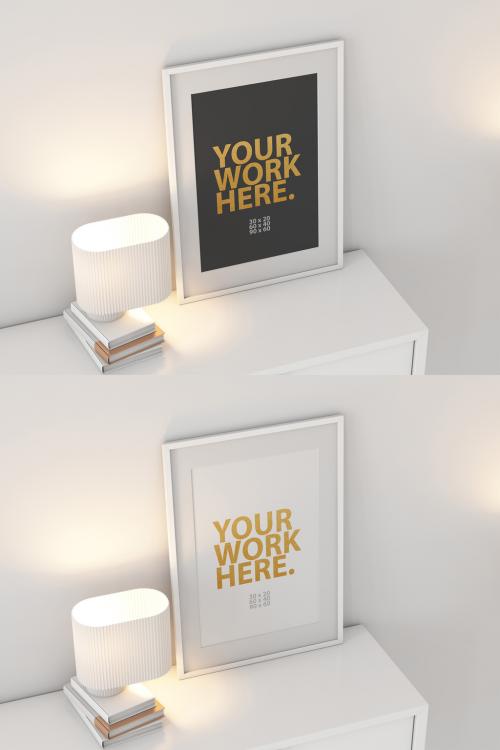 White Poster Art Frame Mockup with passepartout on commode with lamp 591540125