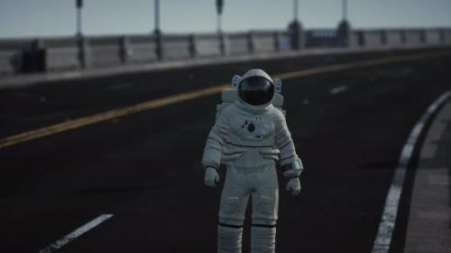 Videohive - Astronaut Walks in the Middle of a Road - 47581947