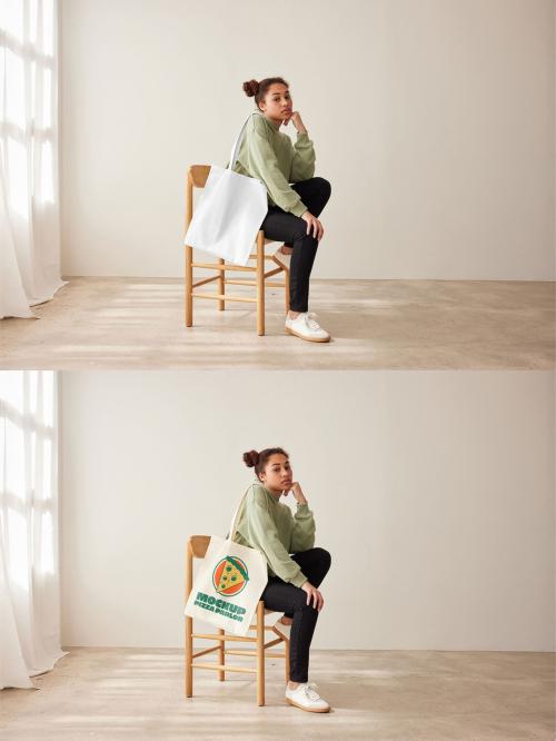 Mockup of woman holding customizable tote bag sitting on chair, side view 637251750