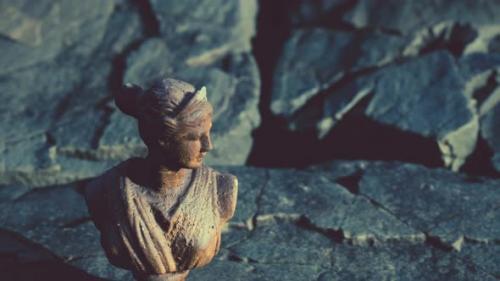 Videohive - Ancient Statue of Woman on Rocky Stones - 47786731