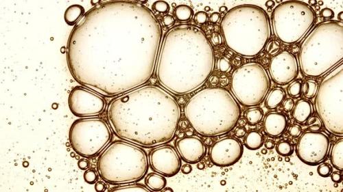 Videohive - Transparent Cosmetic Gel Fluid with Molecule Bubbles Oil Distribution Bubble Cluster Cells Under a - 47737473