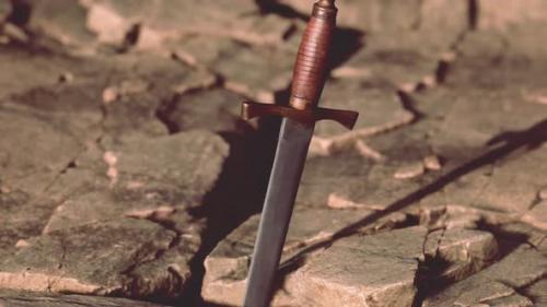 Videohive - Excalibur Sword in Rocky Stone at Sunset - 47787451