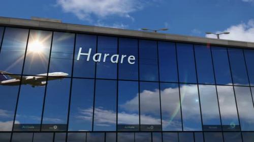 Videohive - Airplane landing at Harare Zimbabwe airport mirrored in terminal - 47905732
