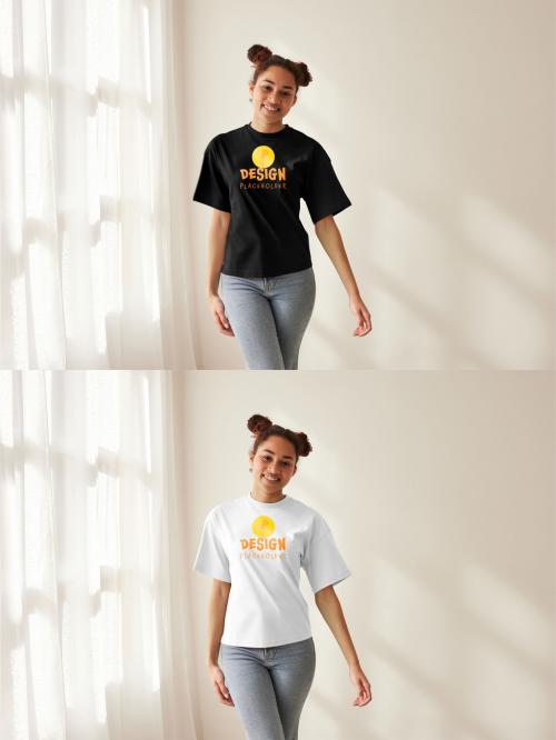 Mockup of woman wearing customizable t-shirt by window, arms by side 640121948