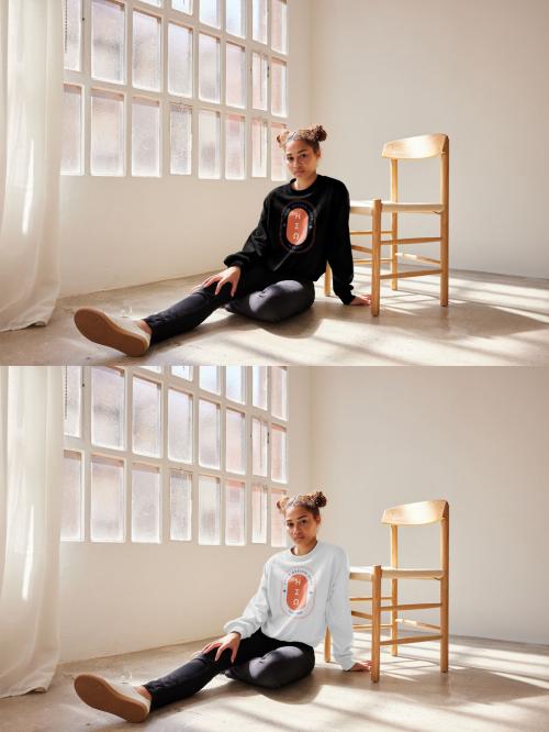 Mockup of woman wearing sweatshirt with customizable color sitting on floor 640120964
