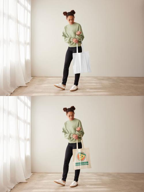 Mockup of woman standing holding customizable tote bag on arm 640120660