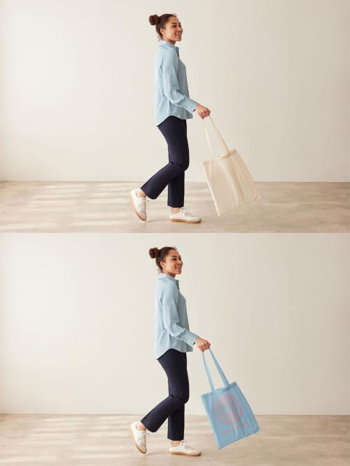 Mockup of woman walking holding customizable tote bag 640120208