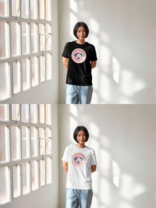 Mockup of Asian woman wearing t-shirt with customizable color and design by window 649153079