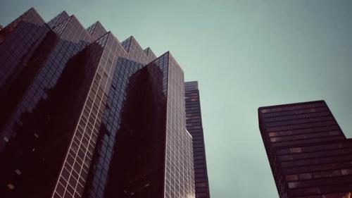 Videohive - Two Towering Skyscrapers Standing Side By Side in a Bustling Cityscape - 48093665