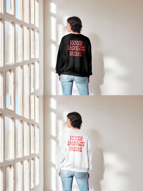 Mockup of woman wearing sweatshirt with customizable color by window, rear view 646710758