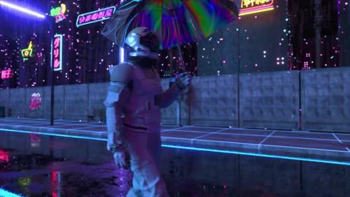 Videohive - Futuristic Concept An Astronaut Walks with an Umbrella Through a Cyberpunk City in the Rain Blue - 48099143