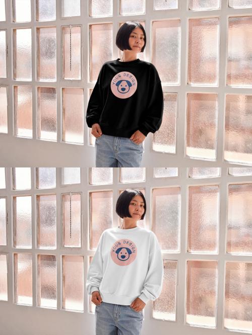Mockup of Asian woman wearing sweatshirt with customizable color leaning against window 644104669