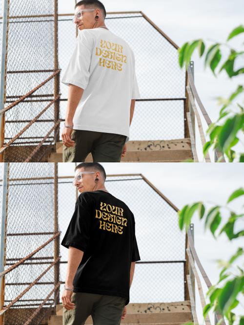 Mockup of man wearing t-shirt with customizable color standing on steps, rear view 644103992