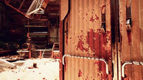 Videohive - A Weathered and Decaying Metal Door in an Abandoned Building - 48388011