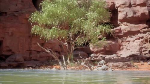 Videohive - Beautiful Day on the River with Sandstone Cliffs and Reflections - 48368773