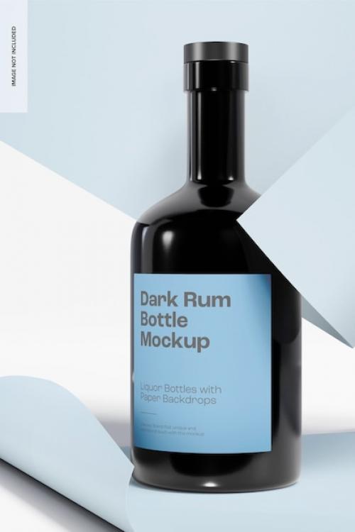 Premium PSD | Dark rum bottle with paper backdrop mockup, front view 02 Premium PSD