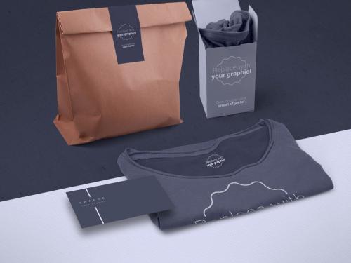 Adobe Stock - T-Shirt Packaging and Business Card Mockup - 319878511
