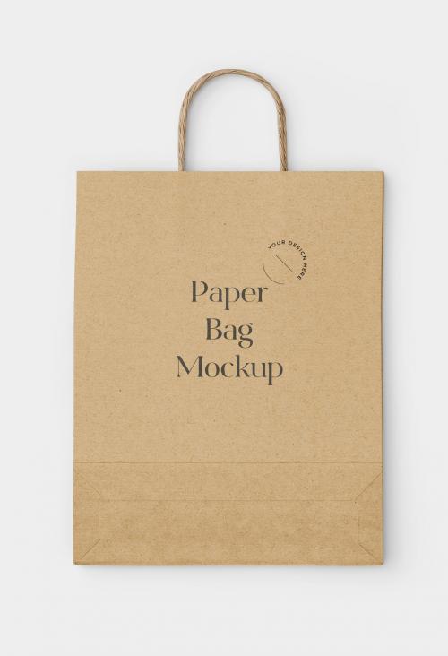 Adobe Stock - Realistic Paper Shopping Bag on White Background Mockup - 334548743