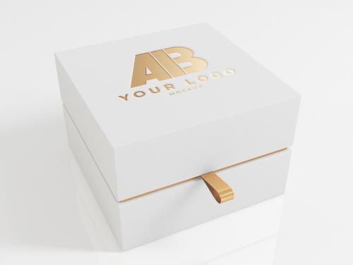 Adobe Stock - Gold Logo on White Luxury Box Mockup - 350951977