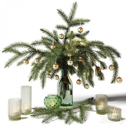 New Year's bouquet of fir branches in a glass vase