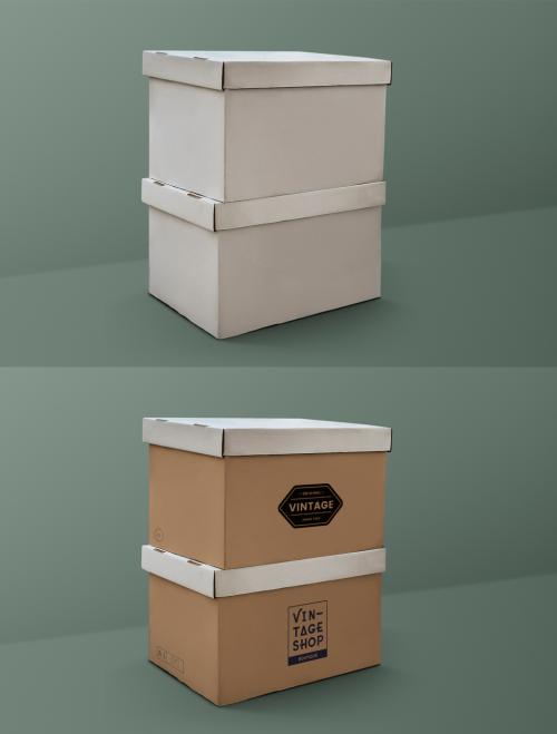 Adobe Stock - Cardboard Box Mockup on Green Background - 457573515