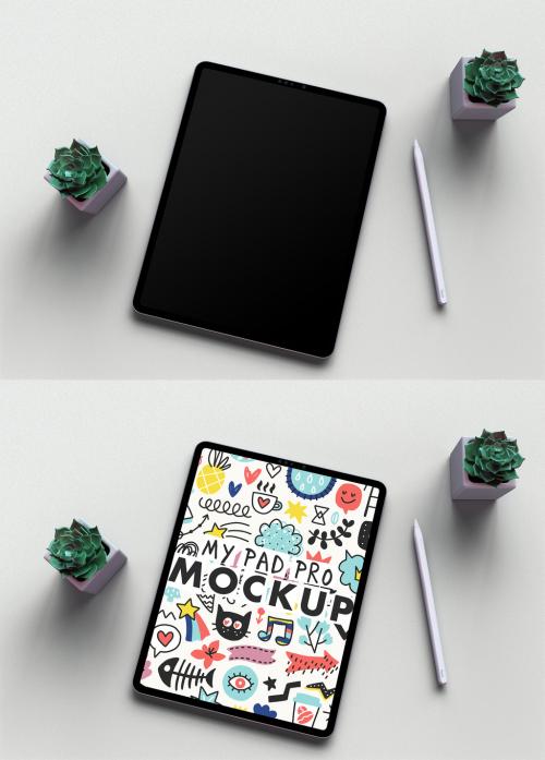 Adobe Stock - Tablet Mockup on a Sandpaper White Desk and Trendy Succulents Green Flowers - 460397919