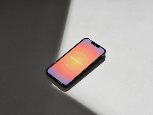 Smartphone on a Gray Background with Shadows