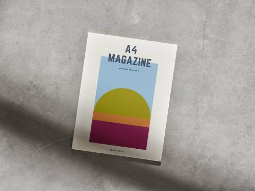 Top View of A4 Magazine on a Grey Surface Mockup