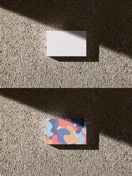 Mockup of a Business Card on a Concrete Texture with Shadow